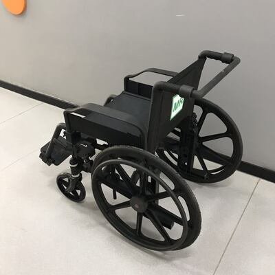 Folded universal wheels featuring removable padded armrest designed for ergonomic movement of carts trolleys and equipment